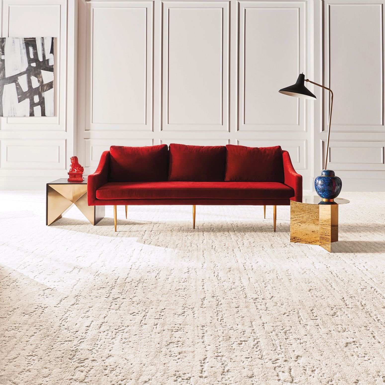 red sofa on a white carpet from U Payless Flooring in Schumacher