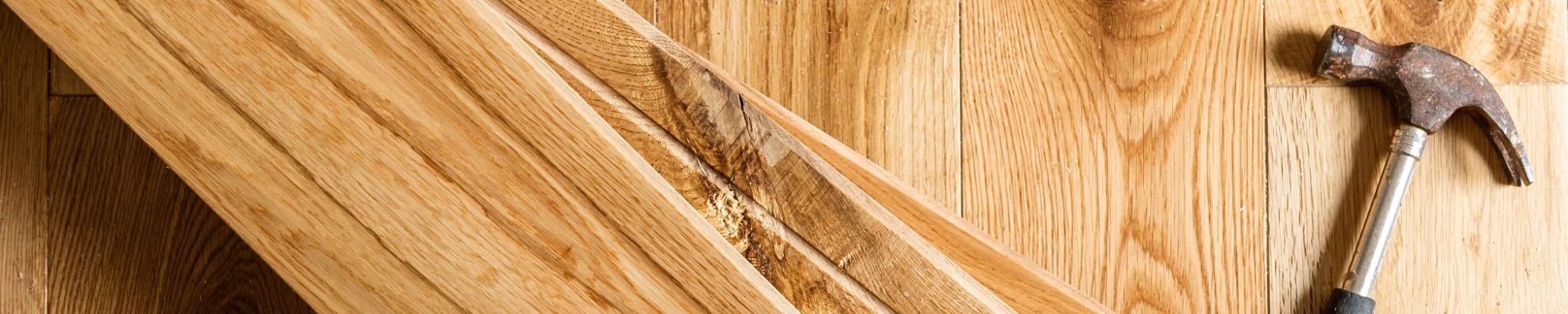 Planks with a hammer from U Payless Flooring in Schumacher, ON