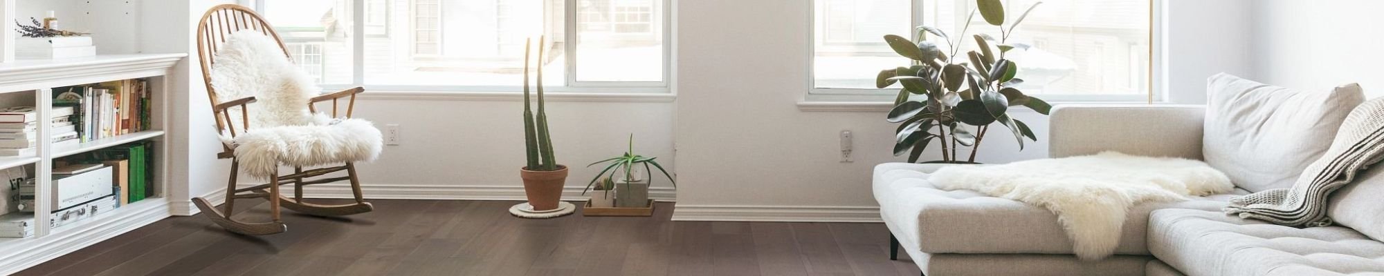 white lovechair and white sofa on hardfloor from U Payless Flooring in Schumacher, ON